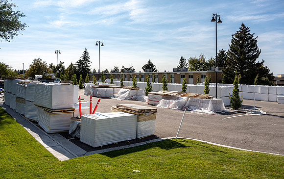 Work is still in progress to put new roofing material on Lamprecht and Chapman Hall office buildings. Work is part of the summer campus construction projects.