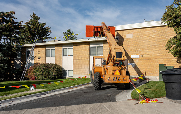 Work is still in progress to put new roofing material on Lamprecht and Chapman Hall office buildings. Work is part of the summer campus construction projects.