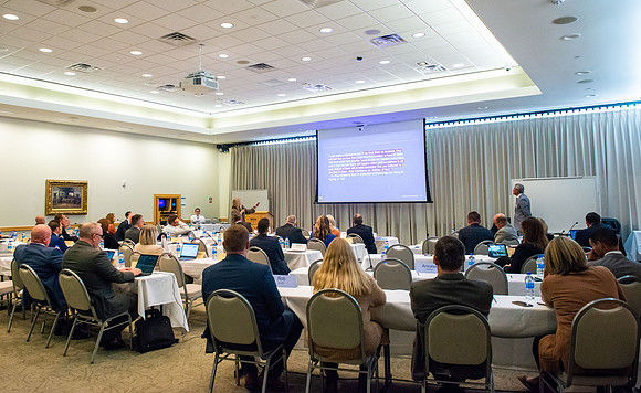 Advancement Council Meeting speakers and interactions.
