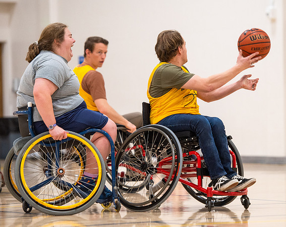 Students participate of Wheelchair Basketball in the Hart Gym.