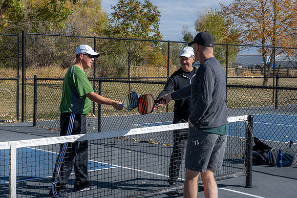 Dinking around playing pickleball for the HR Wellness Video.