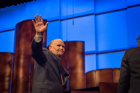 Elder Renlund waves goodbye to the students of BYU-Idaho as he leaves.