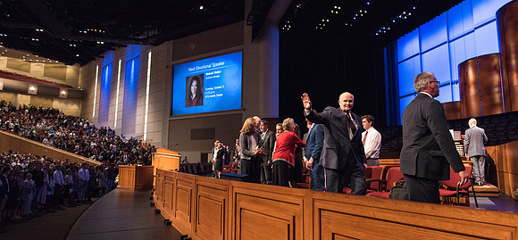 Elder Dale G. Renlund, of the Quorum of the Twelve Apostles, says his goodbyes as he leaves the BYU-Idaho Center.