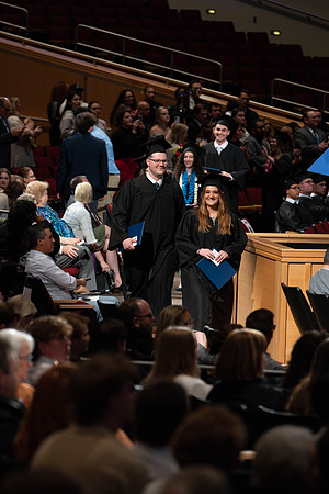 Students graduate from the college of Business and Communication in the I-Center.