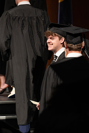 Students graduate from the college of Business and Communication in the I-Center.