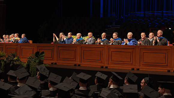 Students graduate from the college of Business and Communication in the I-Center.