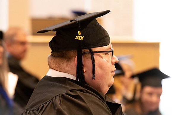 Students graduate from the College of Language and Letters, in the Taylor Building.