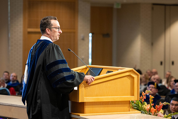 Students graduate from the College of Language and Letters, in the Taylor Building.