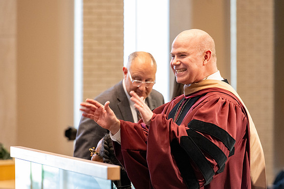 Students graduate from the College of Language and Letters, in the Taylor Building.