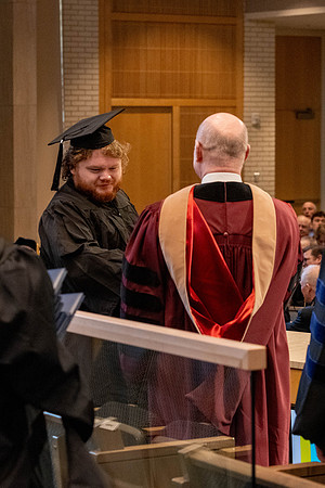 Students graduate from the College of Language and Letters, in the Taylor Building.