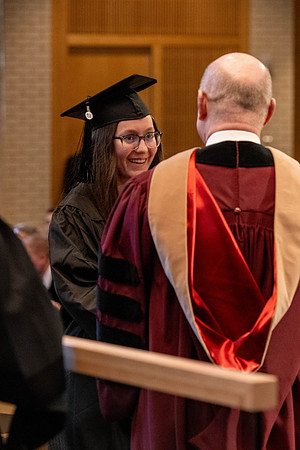 Students graduate from the College of Language and Letters, in the Taylor Building.