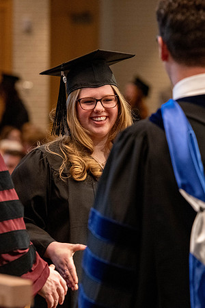 Students graduate from the College of Language and Letters, in the Taylor Building.