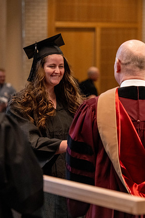 Students graduate from the College of Language and Letters, in the Taylor Building.