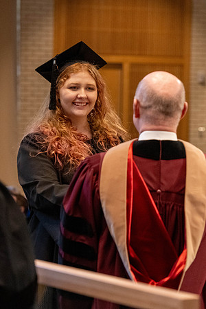 Students graduate from the College of Language and Letters, in the Taylor Building.