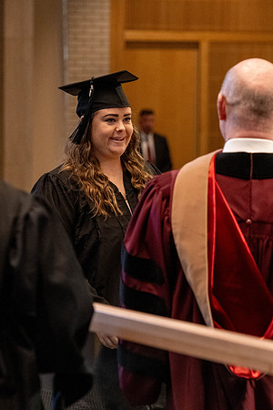 Students graduate from the College of Language and Letters, in the Taylor Building.