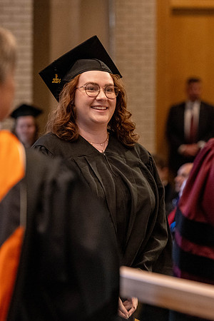 Students graduate from the College of Language and Letters, in the Taylor Building.