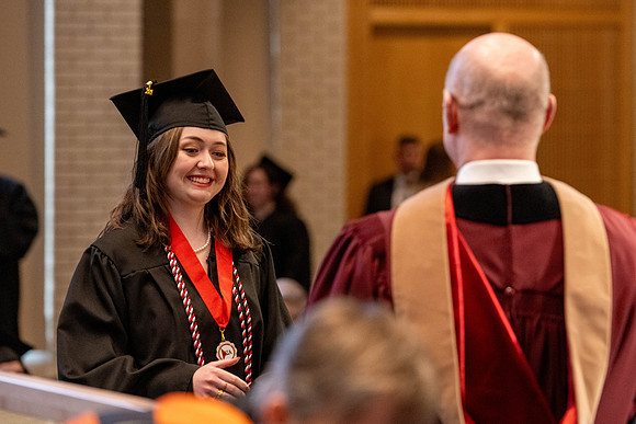 Students graduate from the College of Language and Letters, in the Taylor Building.