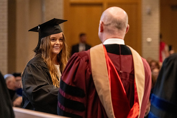 Students graduate from the College of Language and Letters, in the Taylor Building.