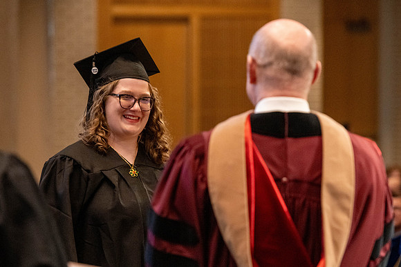 Students graduate from the College of Language and Letters, in the Taylor Building.