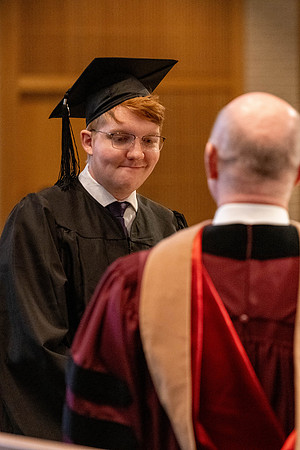 Students graduate from the College of Language and Letters, in the Taylor Building.