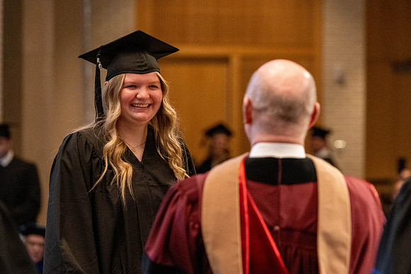Students graduate from the College of Language and Letters, in the Taylor Building.