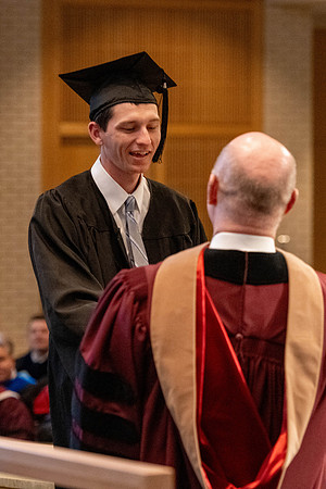 Students graduate from the College of Language and Letters, in the Taylor Building.