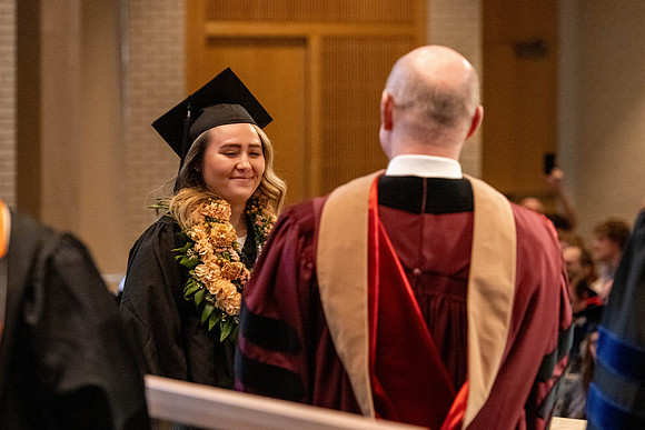 Students graduate from the College of Language and Letters, in the Taylor Building.