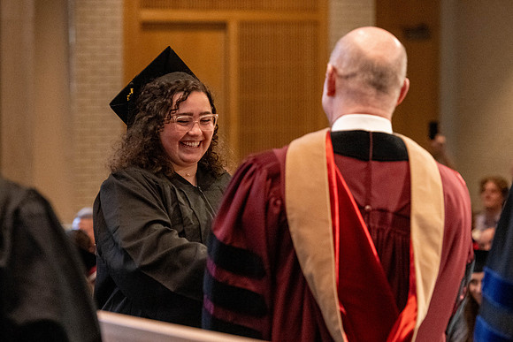Students graduate from the College of Language and Letters, in the Taylor Building.