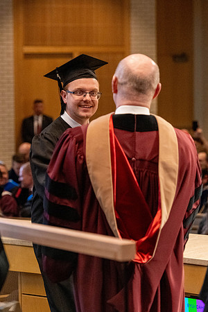 Students graduate from the College of Language and Letters, in the Taylor Building.