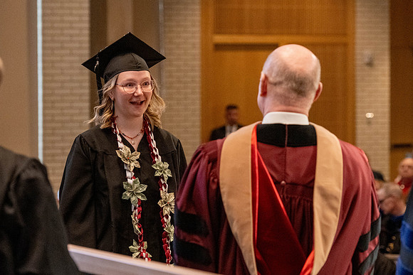 Students graduate from the College of Language and Letters, in the Taylor Building.