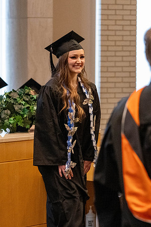 Students graduate from the College of Language and Letters, in the Taylor Building.
