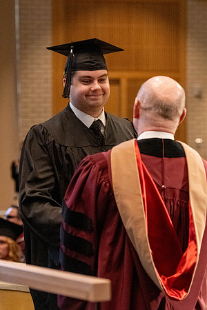Students graduate from the College of Language and Letters, in the Taylor Building.