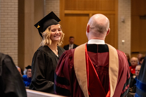 Students graduate from the College of Language and Letters, in the Taylor Building.