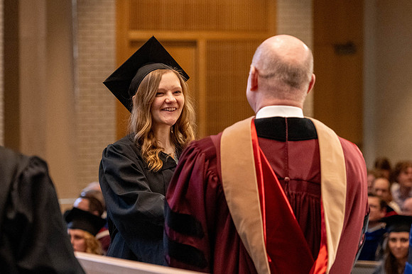 Students graduate from the College of Language and Letters, in the Taylor Building.