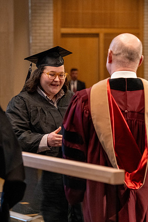 Students graduate from the College of Language and Letters, in the Taylor Building.