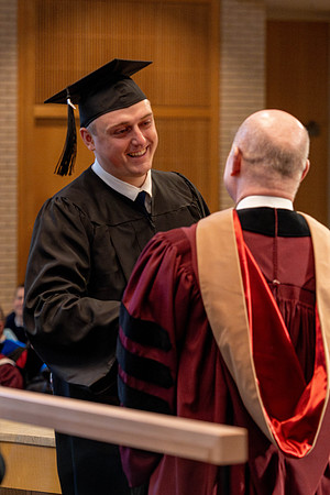 Students graduate from the College of Language and Letters, in the Taylor Building.