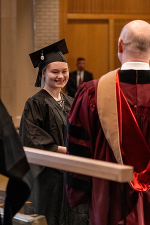 Students graduate from the College of Language and Letters, in the Taylor Building.
