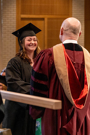 Students graduate from the College of Language and Letters, in the Taylor Building.