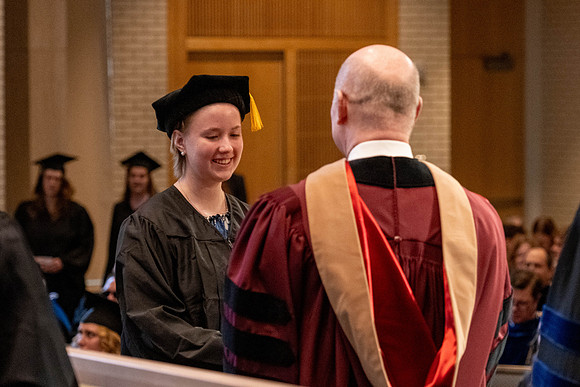Students graduate from the College of Language and Letters, in the Taylor Building.