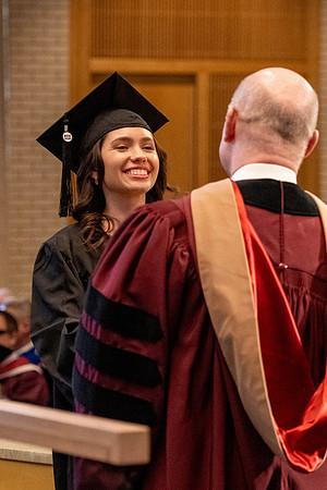 Students graduate from the College of Language and Letters, in the Taylor Building.