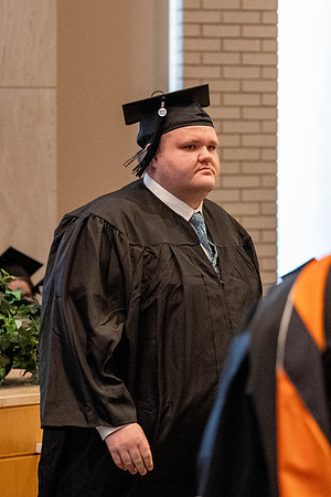 Students graduate from the College of Language and Letters, in the Taylor Building.