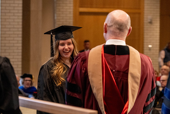 Students graduate from the College of Language and Letters, in the Taylor Building.