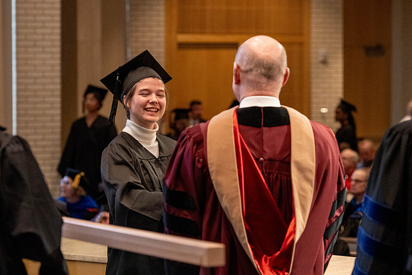 Students graduate from the College of Language and Letters, in the Taylor Building.