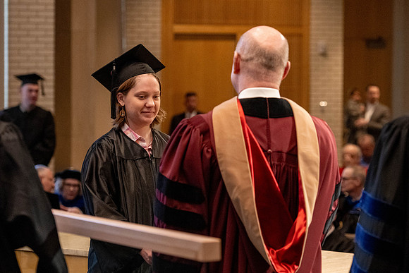 Students graduate from the College of Language and Letters, in the Taylor Building.