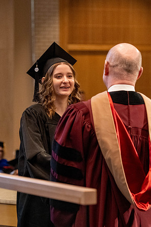 Students graduate from the College of Language and Letters, in the Taylor Building.