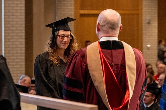 Students graduate from the College of Language and Letters, in the Taylor Building.