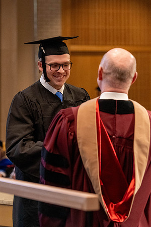 Students graduate from the College of Language and Letters, in the Taylor Building.