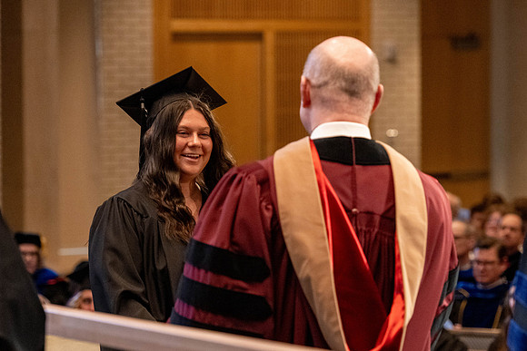 Students graduate from the College of Language and Letters, in the Taylor Building.