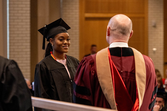 Students graduate from the College of Language and Letters, in the Taylor Building.