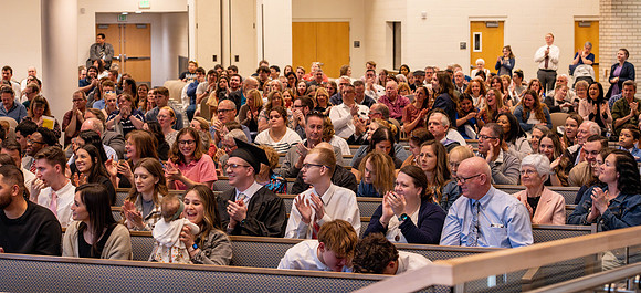 Students graduate from the College of Language and Letters, in the Taylor Building.
